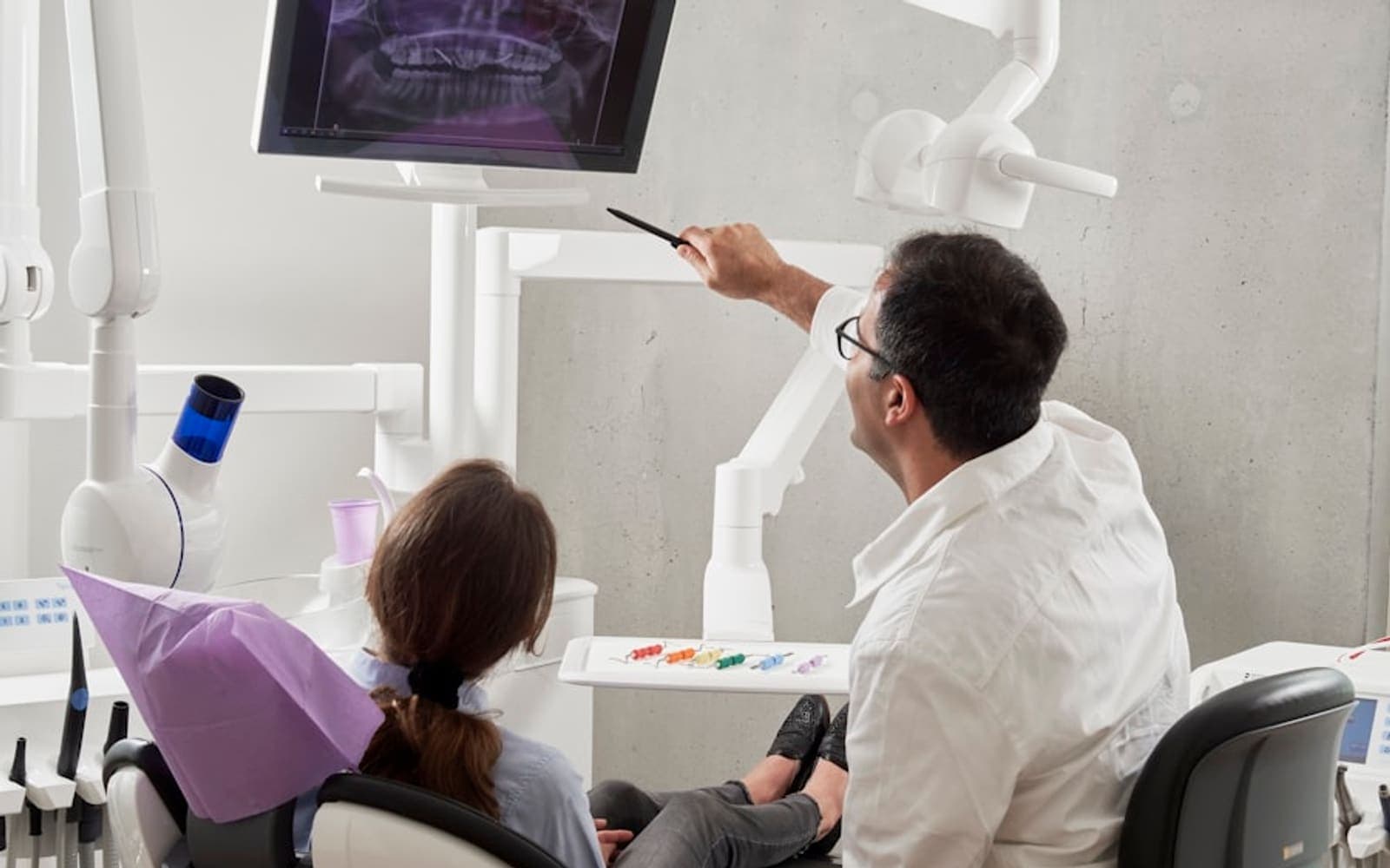 A dentist treating a relaxed patient at BrightSmile Dental